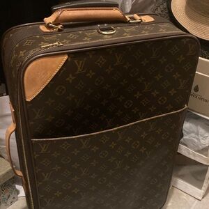 Louis Vuitton Monogram Canvas Rolling Travel Bag with Natural Vachetta Trim